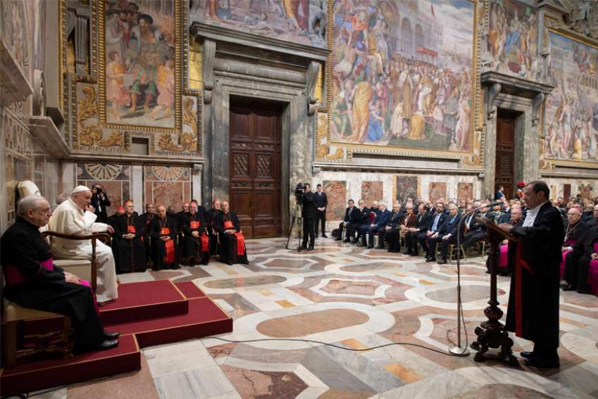 Pope Francis listens as Gian Piero Milano, Vatican chief prosecutor, speaks during an audience at the Vatican Feb. 15, 2020. In a statement released June 5, the Vatican said Milano, and his deputy, Alessandro Diddi, authorized the arrest of Gianluigi Torzi, an Italian broker who was involved in the Vatican Secretariat of State&#039;s majority stake purchase of a property in London&#039;s posh Chelsea district.