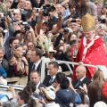 Pope Benedict XVI greets the crowd after celebrating Palm Sunday Mass in St. Peter&#039;s Square at the Vatican April 1. 