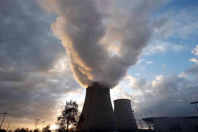 Steam rises from the cooling towers of a nuclear power station at sunset Nov. 25 in Nogent-Sur-Seine, France. 