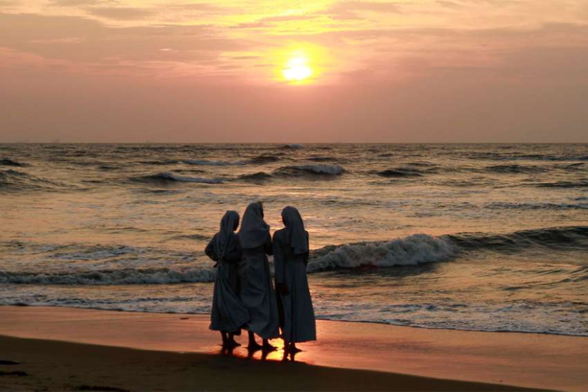 Nuns stand on a beach in Cochin, India, in this 2014 file photo.