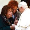 Pope Benedict XVI talks with Enrichetta Vitali, 91, during a visit Nov. 12 to a home for the elderly run by the Sant’Egidio Community in Rome. 