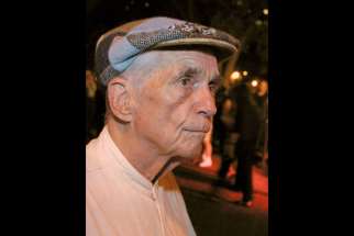 Jesuit Father Daniel Berrigan, an early critic of U.S. military intervention in Vietnam who for years challenged the country&#039;s reliance on military might, died April 30 at 94. He is pictured in a 2002 photo in New York.