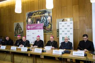 Polish bishops attend a news conference to release the church&#039;s first clerical sex abuse report March 14. In zucchettos, from left, are Bishop Artur Mizinski, secretary-general of the Polish bishops&#039; conference; Archbishops Marek Jedraszewski of Krakow; Stanislaw Gadecki, bishops&#039; conference president; and Wojciech Polak of Gniezno. 