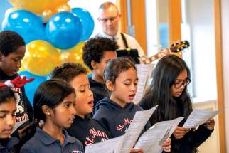 Grade 5 students from St. Maria Goretti supplied the music for the unveiling of the CCAS’s new offices.