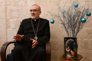 Cardinal Pierbattista Pizzaballa, the Latin patriarch of Jerusalem, gestures during an interview with OSV News at the Latin Patriarchate in the Old City of Jerusalem Dec. 12, 2023.