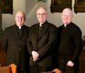From left, Frs. John Hibbard, Richard Whalen and Timothy Shea sit in St. Michael the Archangel Church in Belleville, Ont. All three graduated from the same seminary together and will be celebrating the 40th anniversary of their ordination at St. Theresa Catholic Secondary School April 27.