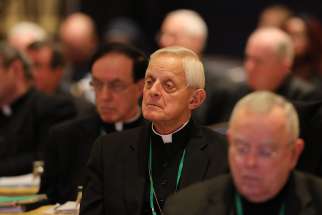 Cardinal Donald W. Wuerl, apostolic administrator of the Washington Archdiocese, listens to a speaker Nov. 14 at the fall general assembly of the U.S. Conference of Catholic Bishops in Baltimore. 