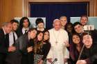 Pope Francis poses for a selfie with a dozen YouTube stars at a May 29, 2016 audience at the Vatican.
