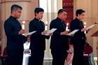 Frater Marlon Bobier Vargas, left, undertook his Profession of Perpetual Vows with the Society of Divine Word (SVD) beside three other young men in their Chicago Chapter in Techny, Ill. on Sept. 21.