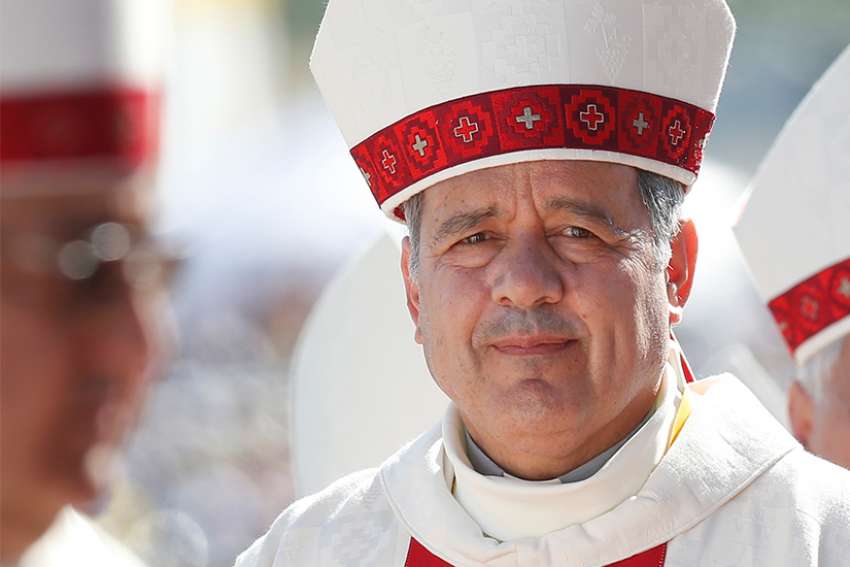 Bishop Juan Barros of Osorno, Chile, arrives in procession for Pope Francis&#039; celebration of Mass near Temuco, Chile, Jan. 17. The Chilean bishop is accused by victims of witnessing and covering up sexual abuse of minors.