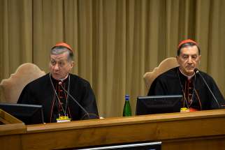 Cardinal Blase J. Cupich of Chicago and Cardinal Ruben Salazar Gomez of Bogota, Colombia, attend the second day of the meeting on the protection of minors in the church, at the Vatican Feb. 22, 2019.