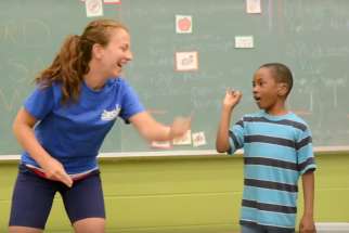 Silent Voice camp counsellor and camper at Silent Voice&#039;s Sign Language Summer Program. 
