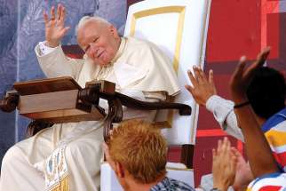  In one of Arturo Mari&#039;s famous photos, he shows Pope John Paul II celebrating his final international World Youth Day in Toronto in 2002. 