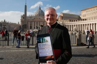 Archbishop Leo Cushley of the Scottish Archdiocese of St. Andrew&#039;s and Edinburg launches the new Catholic App in St. Peter&#039;s Square on Nov. 22.
