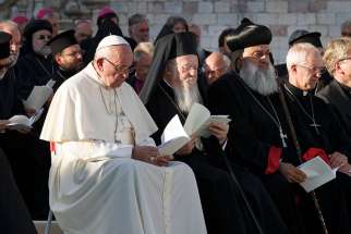 Pope Francis and Orthodox Ecumenical Patriarch Bartholomew of Constantinople in Assisi, Italy, Sept. 20, 2016. Both leaders are scheduled to attend a peace conference with Sheik Ahmad el-Tayeb, grand imam of al-Azhar University.