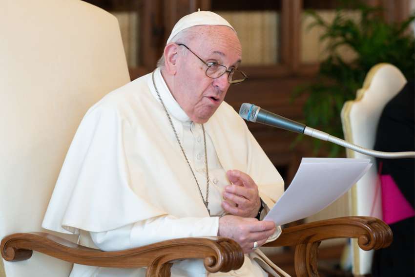 Pope Francis speaks during his general audience in the library of the Apostolic Palace at the Vatican March 17, 2021. The pope spoke about the role of the Holy Spirit in making Jesus present in people&#039;s lives.