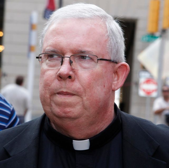Msgr. William J. Lynn, former secretary of clergy in the Archdiocese of Philadelphia, walks from the courthouse as the jury deliberates during a sexual abuse trial in Philadelphia June 20. Msgr. Lynn was later found guilty of child endangerment but acqui tted on two other charges in the Philadelphia child sex abuse trial.