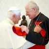 Pope Benedict XVI greets Italian Cardinal Angelo Scola of Milan during a private audience at the Vatican Feb. 16.