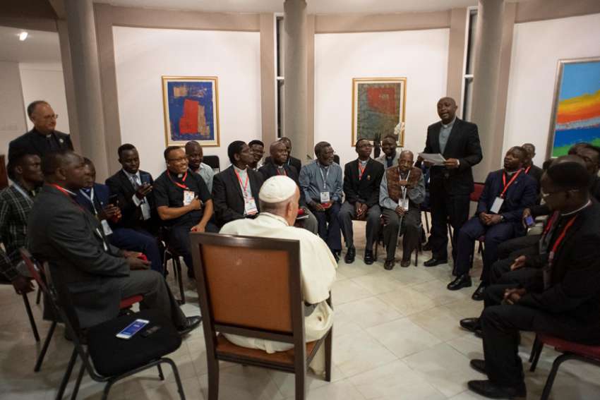 Pope Francis meets with Jesuits in Maputo, Mozambique, Sept. 5, 2019. One of the Jesuits asked Pope Francis how his experience of God has changed since he was elected pope in 2013; he replied that he has greater responsibilities now and his prayers of intercession include global concerns, but he is still a sinner who goes to confession every two weeks.
