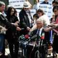 Protestors and media gather following the B.C. Supreme Court decision June 15 to strike down Criminal Code provisions against euthanasia and assisted suicide.