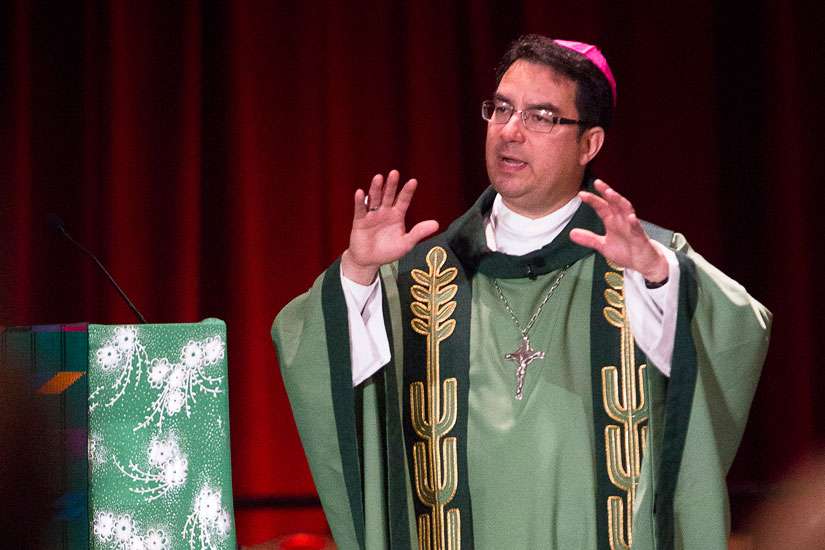 Bishop Oscar Cantu of Las Cruces, N.M., gives the homily at a Feb. 9 Mass in Washington.