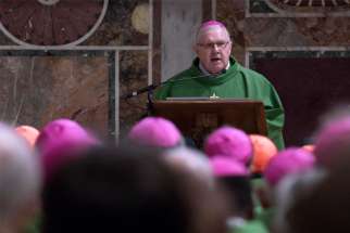 Archbishop Mark Coleridge of Brisbane, president of the Australian bishops&#039; conference, gives the homily during Mass at a meeting on the protection of minors in the church at the Vatican Feb. 24, 2019. A six-person committee charged with reviewing church governance and management is expected to present Australia&#039;s bishops with a plan to overhaul the management of the church in the country.
