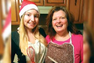It wouldn’t be Christmas if Kristen Curtis, left, wasn’t baking cookies with her mother, Michelle.