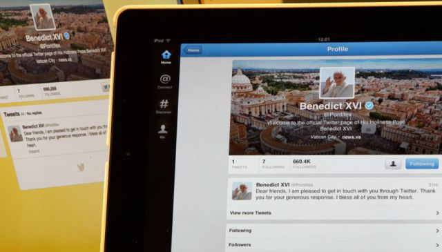 Pope Benedict XVI&#039;s Twitter account is pictured with his first tweet on an iPad tablet.