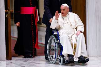 Pope Francis arrives in a wheelchair to meet with participants in the plenary assembly of the women&#039;s International Union of Superiors General (UISG) at the Vatican May 5, 2022.