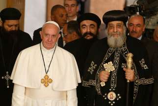 Pope Francis pictured with Coptic Orthodox Pope Tawadros II in Cairo April 28. The two religious leaders signed a joint declaration to end longtime disagreement over the sacrament of baptism.