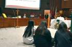 Three students moved closer to the Blessed Sacrament during a guided Adoration at a Young Disciples event at Toronto’s Catholic Education Centre. 