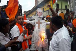 Hindu nationalists burning an effigy of Cardinal Telesphore Toppo, archbishop of Ranchi, India on in Sept. 2017. 
