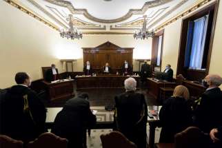 The courtroom is pictured during the trial of Angelo Caloia, former president of the Institute for Works of Religion, at the Vatican Jan. 21, 2021. Caloia, the former director of the so-called Vatican bank, and his lawyer, Gabriele Liuzzo, were found guilty of money laundering and embezzling millions of euros from the sale of Vatican properties. Both received a prison sentence of 8 years and 11 months and ordered to pay a fine of 12,500 euro ($15,200).