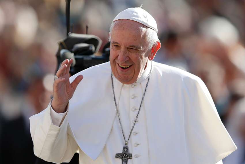 Pope Francis greets the crowd during his general audience in St. Peter&#039;s Square at the Vatican Nov. 7. 