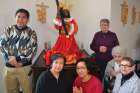Fr. Nilo Macapinlac (left) and other devotees of the Black Nazarene statue currently at Sacred Heart parish in Wetaskiwin, Alta.
