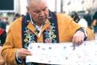 Manitoba Metis Federation president David Chartrand points to a photo of Louis Riel. Chartrand hopes the Pope will visit Riel’s grave.