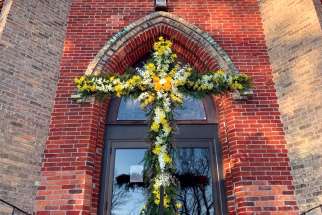 Michael Madden, a parishioner at St. Mary Immaculate Church in Elora, Ont., made sure the Easter season was celebrated at church despite the pandemic. He constructed a cross that was erected on the fifth Sunday of Lent and painted purple, then red for Palm Sunday, and finally decorated with flowers for Easter Sunday.