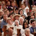 People listen as Philadelphia Archbishop Charles J. Chaput delivers the homily during Mass at the basilica of the National Shrine of the Immaculate Conception in Washington July 4, the final day of the bishops&#039; &quot;fortnight for freedom&quot; campaign. 