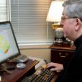 Archbishop Thomas Collins visits the new Archdiocese of Toronto online donation portal.