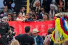 A red memorial banner inscribed with 4120 names of many of the children who never came home from all residential schools across Canada is carried at a meeting with Pope Francis at Maskwacis, Alberta, July 25, 2022.