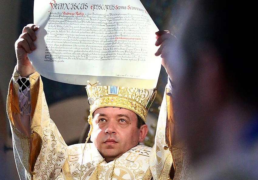 Pope Francis has named Auxiliary Bishop Andriy Rabiy of the Ukrainian Catholic Archeparchy of Philadelphia -- pictured in this 2017 photo holding an official apostolic letter from the pope -- as auxiliary bishop for Ukrainian Archeparchy in Winnipeg, Manitoba.