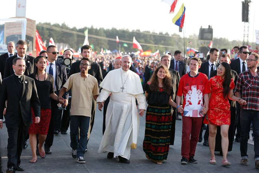 Pope Francis walks with World Youth Day pilgrims as he arrives for a July 30 prayer vigil at the Field of Mercy in Krakow, Poland. Nigerian pilgrims hope their experience at World Youth Day 2016 will help affect change with challenges back home.