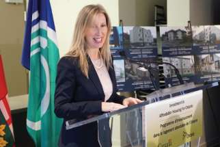 Suzanne Le, executive director of Multifaith Housing Inititatives, speaks last month at a funding announcement by all three levels of government for affordable housing.