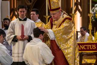 Thomas Cardinal Collins ordained four men to the priesthood, May 14, 2022.