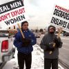 Art Bondy, left, and Deacon Mike Horoky take part in a recent anti-pornography picket in Windsor, Ont.