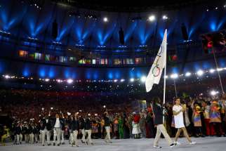 The new Refugee Olympic Team arrives for the opening ceremony in Rio de Janeiro Aug. 5. In a personal message addressed to each of the 10 members of the team, Pope Francis wished them success in their events and thanked them for the witness they are giving the world.