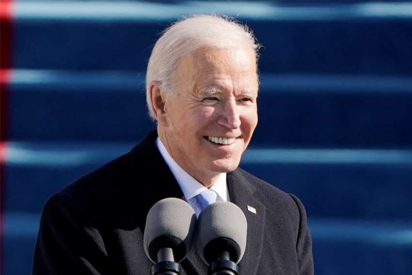 U.S. President Joe Biden smiles as he speaks during his inauguration at the Capitol in Washington Jan. 20, 2021.