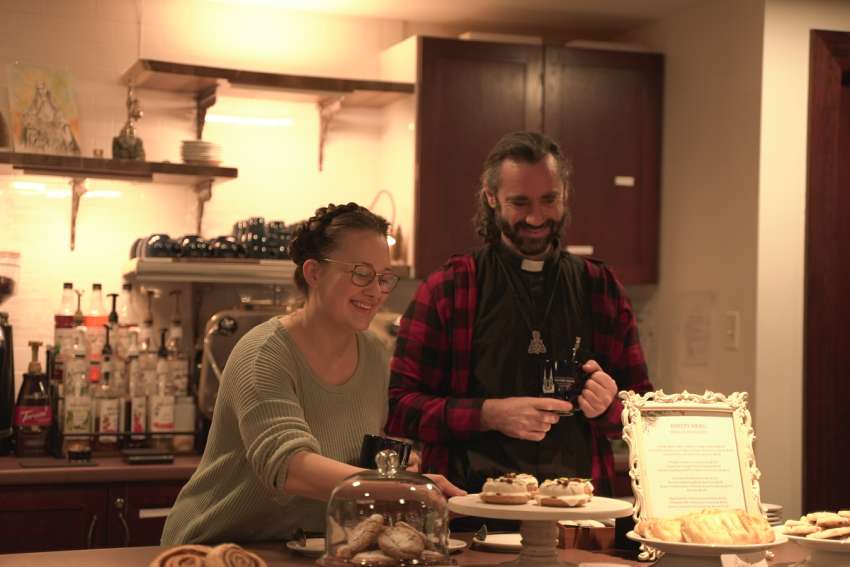 Café des Tours supervisor Sapphira Sinasac, along with Fr. David Bergeron, at the café within Ottawa’s Notre Dame Cathedral Basilica.