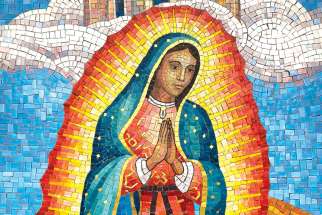 A mosaic depicts Our Lady of Guadalupe at a shrine to her at St. Juan Diego Catholic Church in Pasadena, Texas.