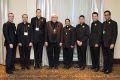 Cardinal Thomas Collins (fourth from the left) poses with the 2014 Ordinandi Class - deacons John Perdue, Dave Walter, Scott Birchall, Michael Simoes, Omar Hernandez, Marijan  Šiško and Neiman D&#039;Souza (left to right) - at the 24th annual Ordinandi Dinner.